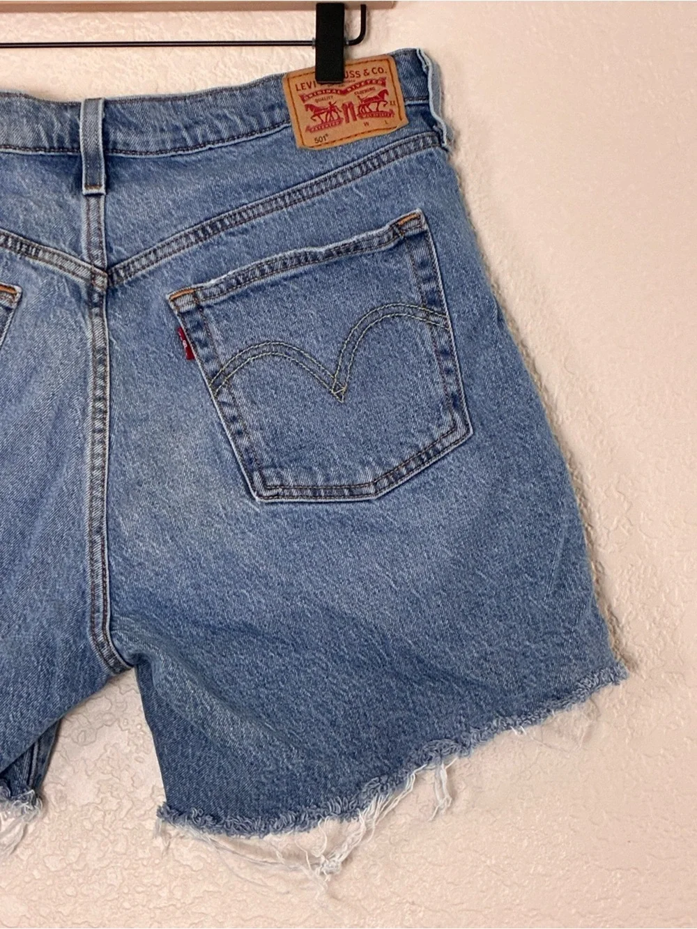 Levi’s | 501 button fly raw hem cut off long jean shorts bermuda denim size 32